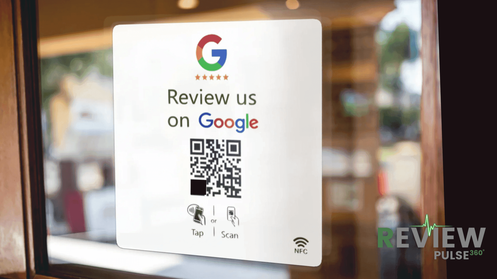 Review us on Google sign with QR code and NFC tap icons on a glass door.