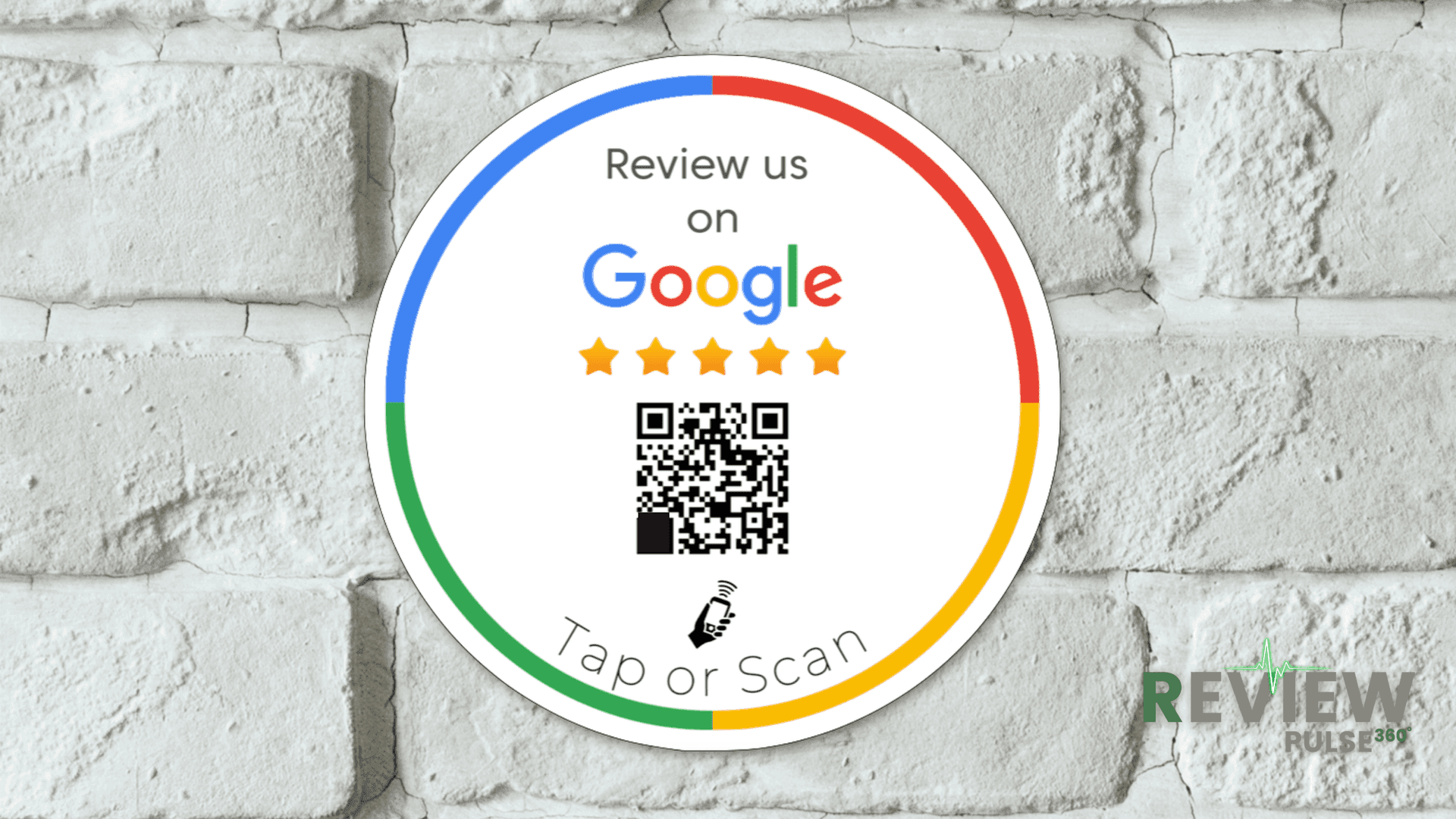 Circular sign on white brick wall prompting Google reviews with five stars and a QR code to scan.